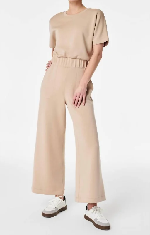 Boutique Styles Airessential Cropped Jumpsuit In Tahini